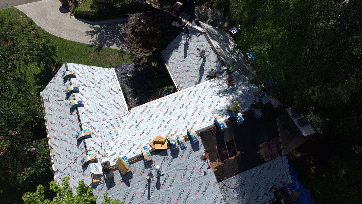 Aerial view of a full roof replacement underway in Oak Ridge TN